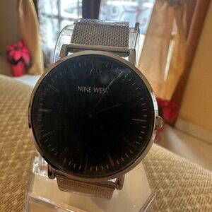New Nine West Men's Watch with Black Dial and Silver Mesh Band. Plastic still on